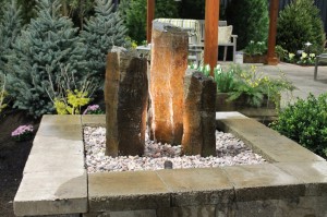 Rock-column fountains like this one at Earth Tones Hardscape are trendy for 2014.